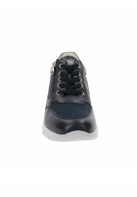 Black sneaker with a textured mesh upper, lace-up closure, and side zipper. Features a white rubber sole and minimalistic design.