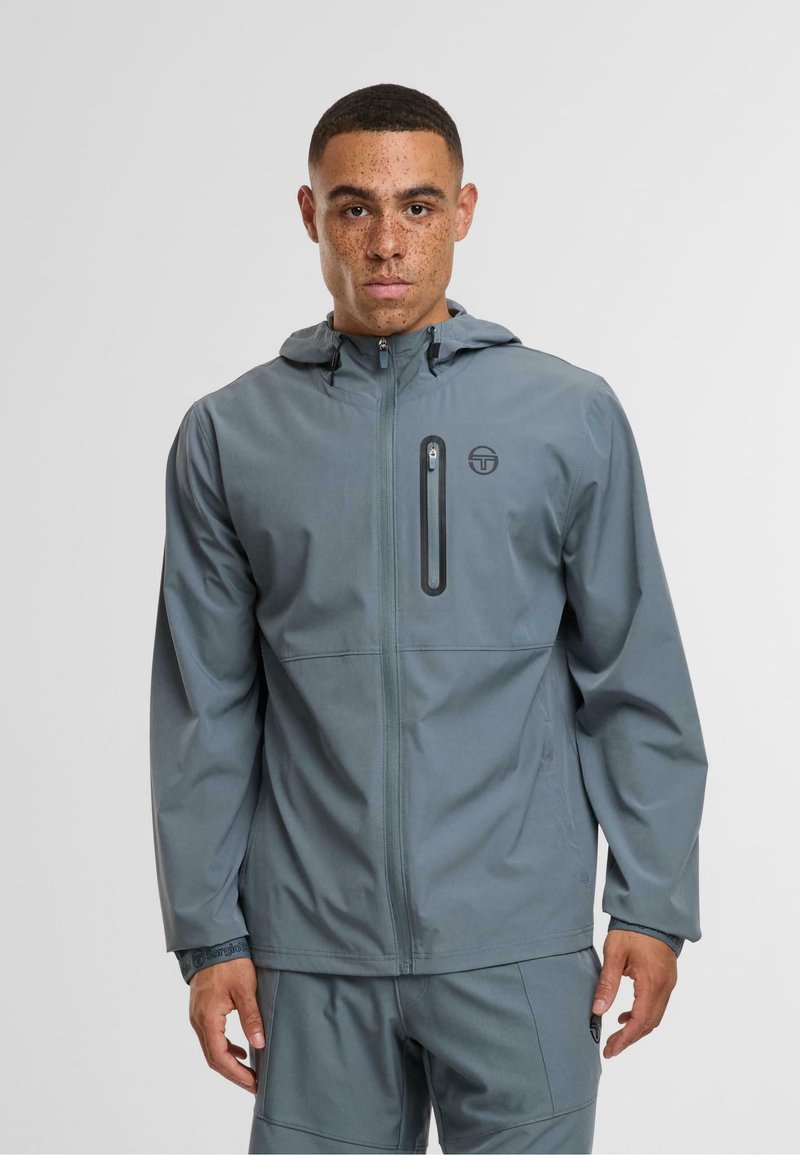Gray lightweight jacket with a hood, featuring a front zip closure and chest pocket, made from smooth, water-resistant material.