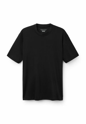 Camiseta negra de manga corta, elaborada con algodón de primera calidad, que presenta un cuello redondo clásico, una textura suave y un dobladillo recto. Sin gráficos ni patrones.