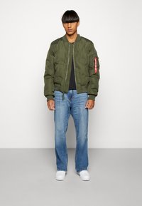 Alpha Industries MA-1 LOGO PUFFER - Pilotska jakna - dark olive
