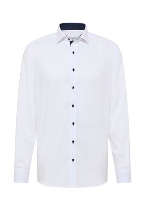 Hvid langærmet skjorte med sorte knapper og en marineblå polka dot indre krave. Glat stof, skræddersyet pasform med et klassisk design.