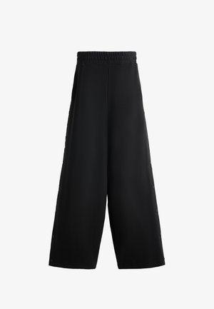 Zwarte wijde broek gemaakt van zachte stof, met een elastische tailleband en knopen aan de zijkanten voor een verstelbare pasvorm en detail.