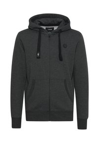 Sudadera con cremallera de color gris oscuro, con capucha ajustable, bolsillos laterales, puños acanalados y detalle de logo en el pecho. Fabricada con un tejido suave.