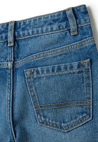 OVS CULOTTE WITH STUDS AND ABRASIONS - Vaqueros a campana - medium wash