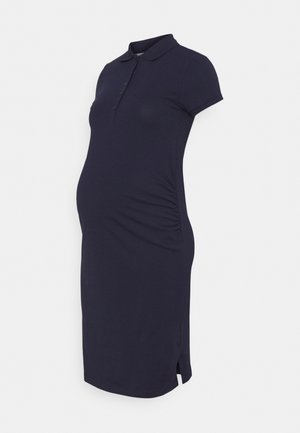 Marineblaues Polokleid mit kurzen Ärmeln, seitlicher Raffung und Kragen. Aus weichem Stoff gefertigt, mit durchgehendem Knopfverschluss vorne und seitlichem Schlitz am Saum.