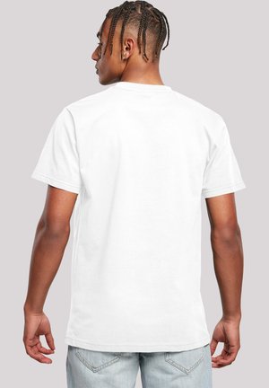 White cotton t-shirt with short sleeves, round neckline, and stitched hem. The fabric appears soft and smooth with a simple design.