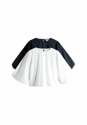 Two loose-fit blouses with puffed long sleeves in black and white, each featuring a round neckline and a back button closure.