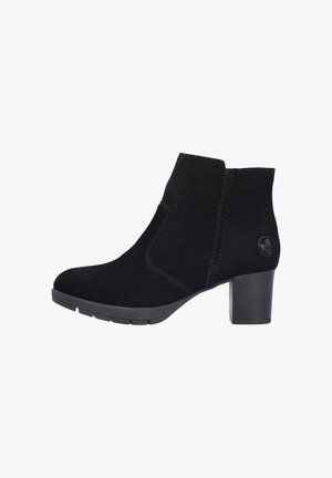 Black suede ankle boot with curved design, rubber sole, and a block heel. Features tonal stitching and a circular logo accent on the side.