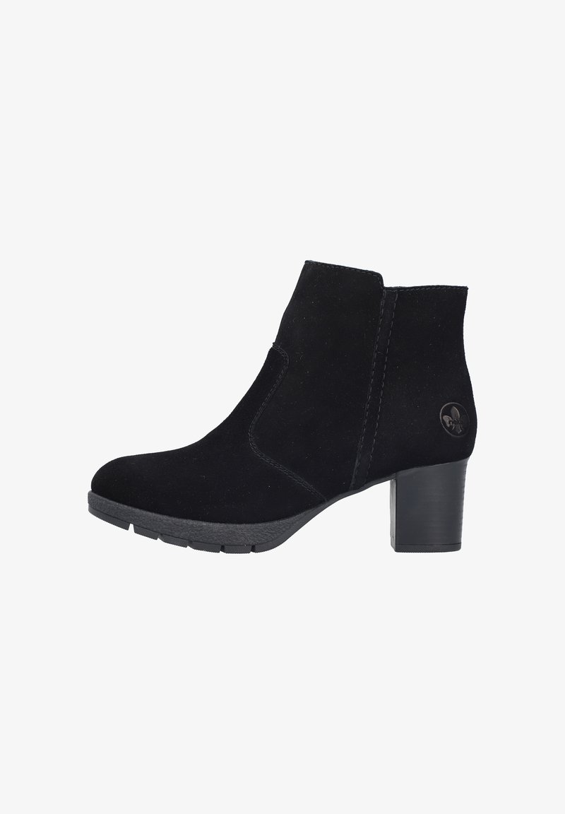 Black suede ankle boot with curved design, rubber sole, and a block heel. Features tonal stitching and a circular logo accent on the side.