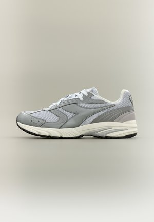 Light gray and white athletic sneaker with mesh upper, lace-up closure, and black sole, shown from the side on a neutral background.