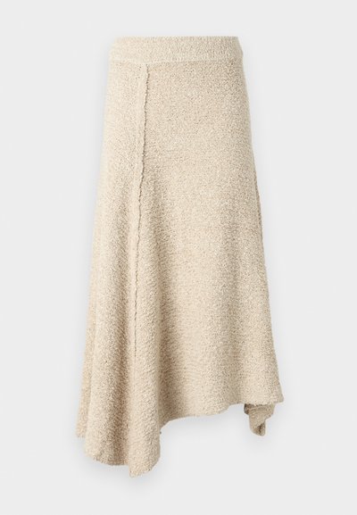 Beige textured skirt with a flared hem, featuring a high waist and an asymmetric cut, made from soft knitted material.