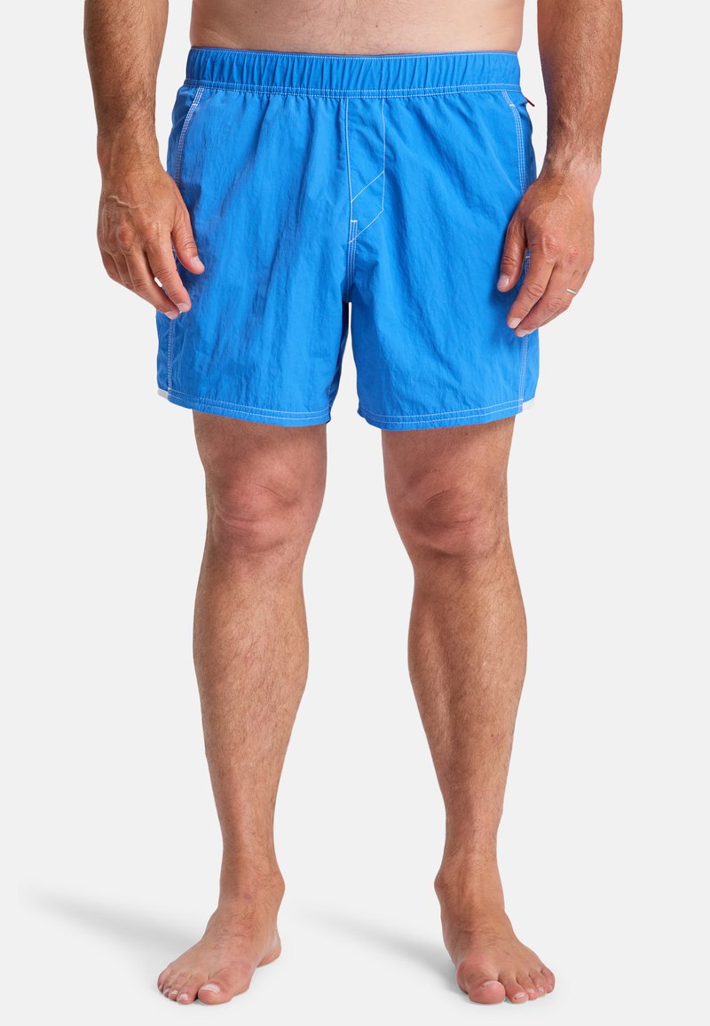 Blue swim shorts with an elastic waistband, white stitching, and a loose fit. Made from lightweight fabric suitable for water activities.