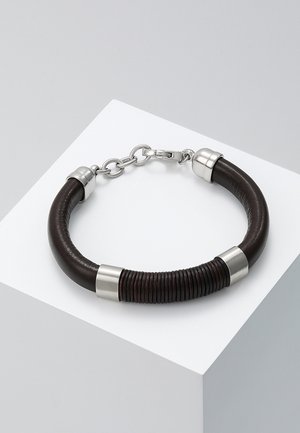Men's dark brown leather bracelet with silver metal clasp, chain links, and decorative rings, displayed on a white pedestal.