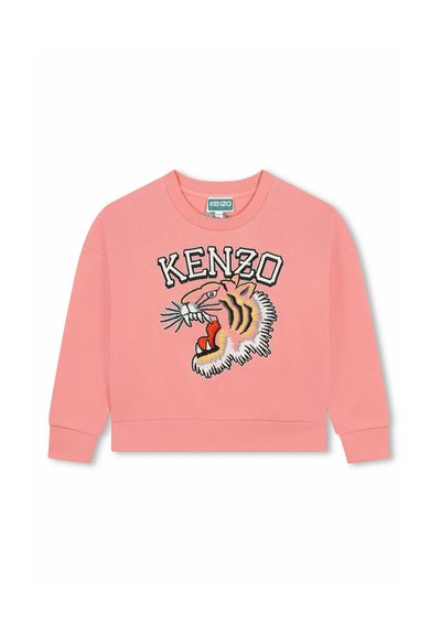 Sweatshirt rose avec un motif brodé de tête de tigre, col rond, manches longues, et finitions côtelées à l'ourlet et aux poignets.