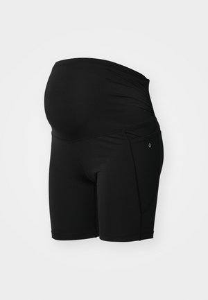 Juodi nėštumo šortai, pagaminti iš lygaus, tamprumo audinio; turi platų, susiraukšlėtą juosmeninį diržą ir šoninę kišenę patogumui.