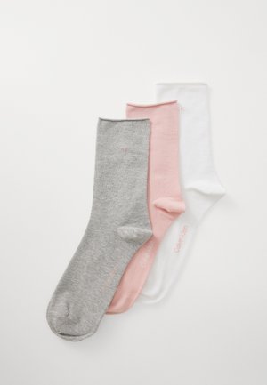Three pairs of crew socks: grey, pink, and white. Each sock has a smooth texture with a ribbed cuff and a small brand logo near the ankle.