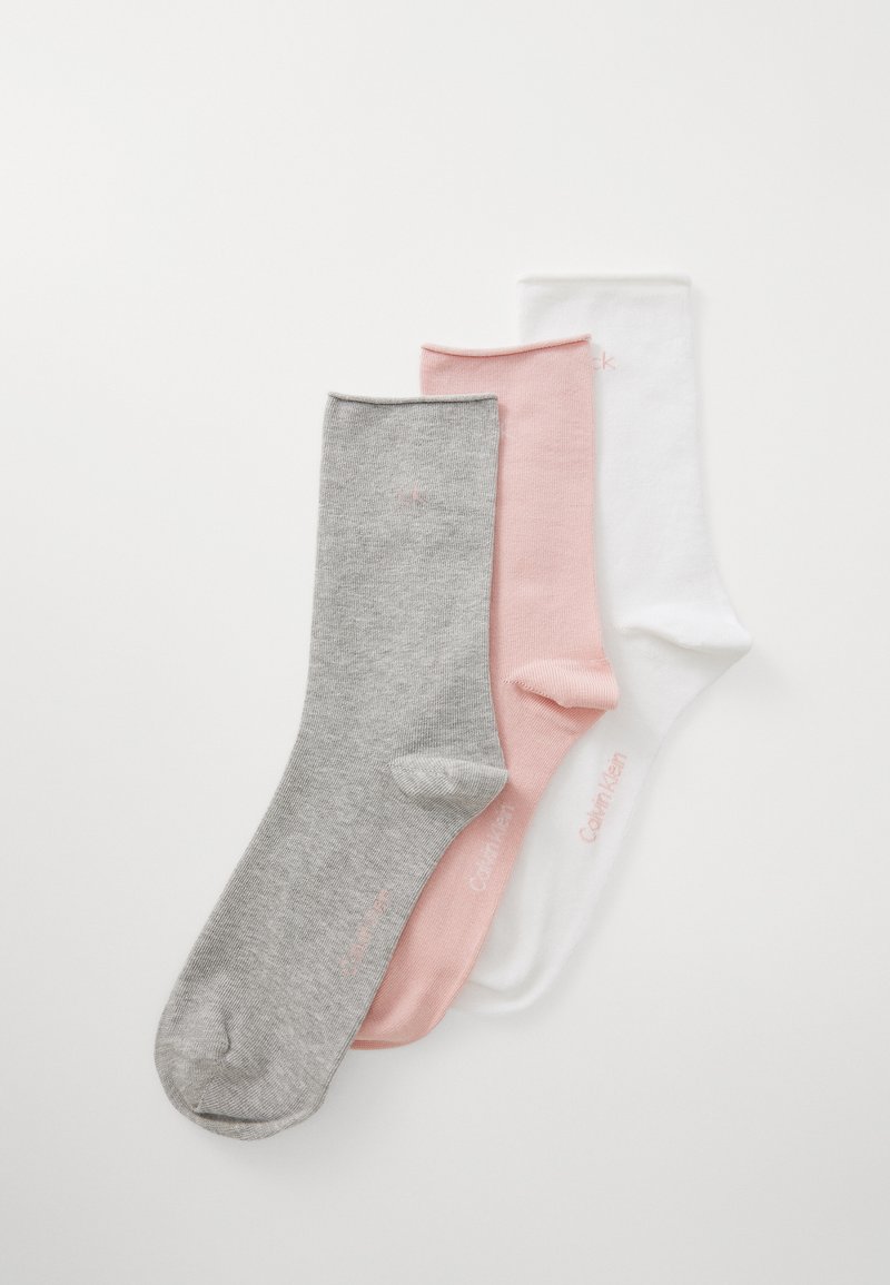 Three pairs of crew socks: grey, pink, and white. Each sock has a smooth texture with a ribbed cuff and a small brand logo near the ankle.