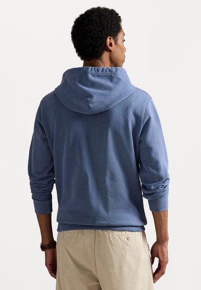 Hoodie in lichtblauw, van katoen, met een relaxte fit, ribgebreide manchetten en zoom, met een opvallende achterste capuchonzijn.