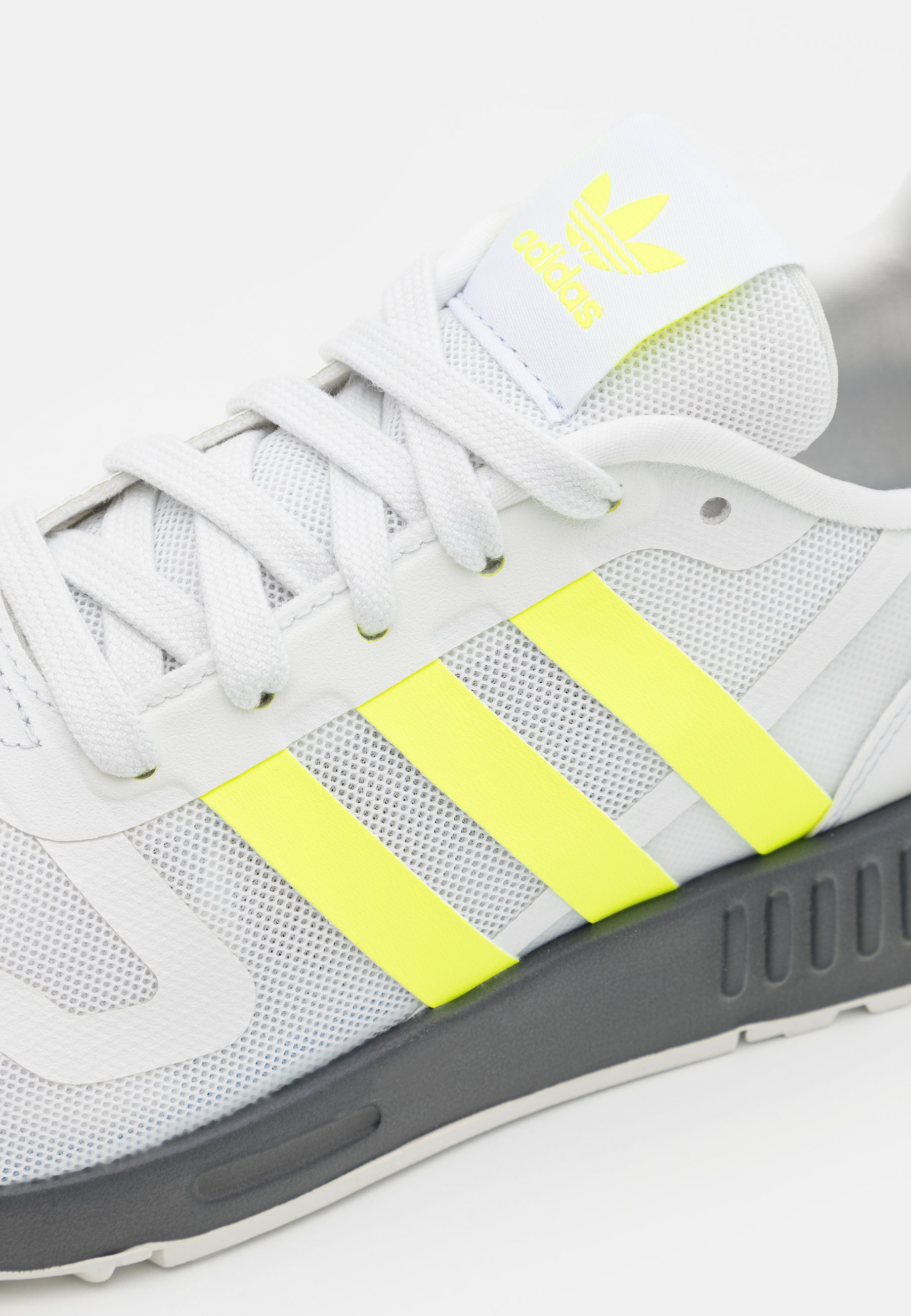 yellow trainers adidas