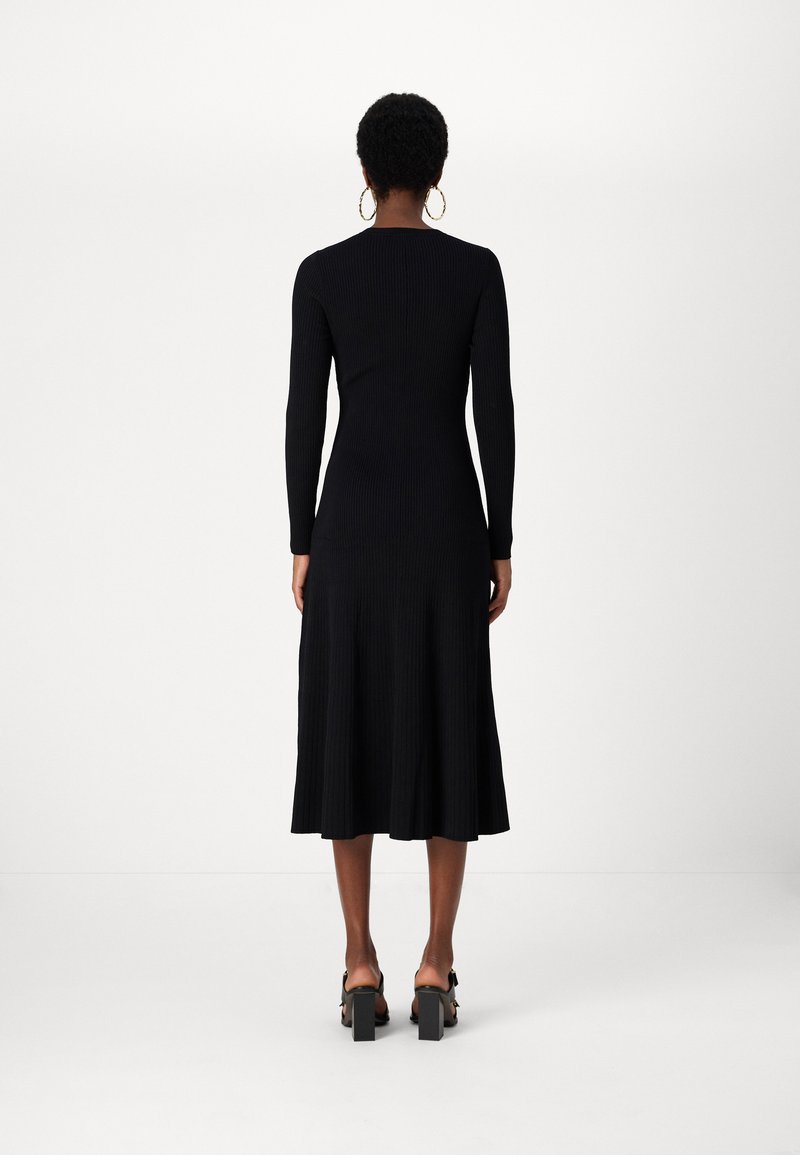 Robe Pull DKNY Noire Sans Manches - Col Tortue, Taille M/L, Occasion Très Bon état