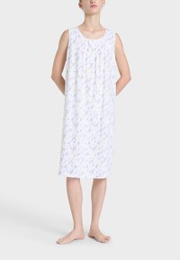 Camicia da notte bianca senza maniche con un motivo floreale in lavanda e giallo, caratterizzata da un collo a giro e una vestibilità morbida per il massimo comfort.