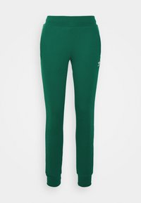 Gröna sweatpants i mjukt material, med en avsmalnande design, elastisk midja och ribbade muddar. Minimal logga på vänster höft.