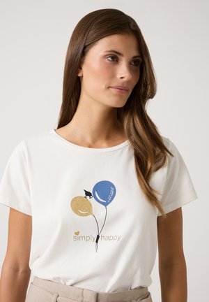 White cotton t-shirt featuring a graphic design of three balloons in blue, gold, and yellow, with the text "simply happy" underneath.