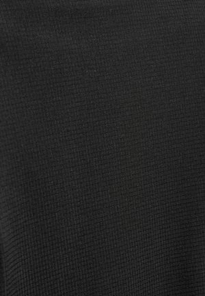 Black fabric with a subtle grid texture pattern, showing fine horizontal and vertical lines.