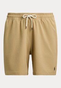 Shorts beiges pour homme avec taille élastique, cordon blanc et petit logo noir sur la partie inférieure de la jambe droite.