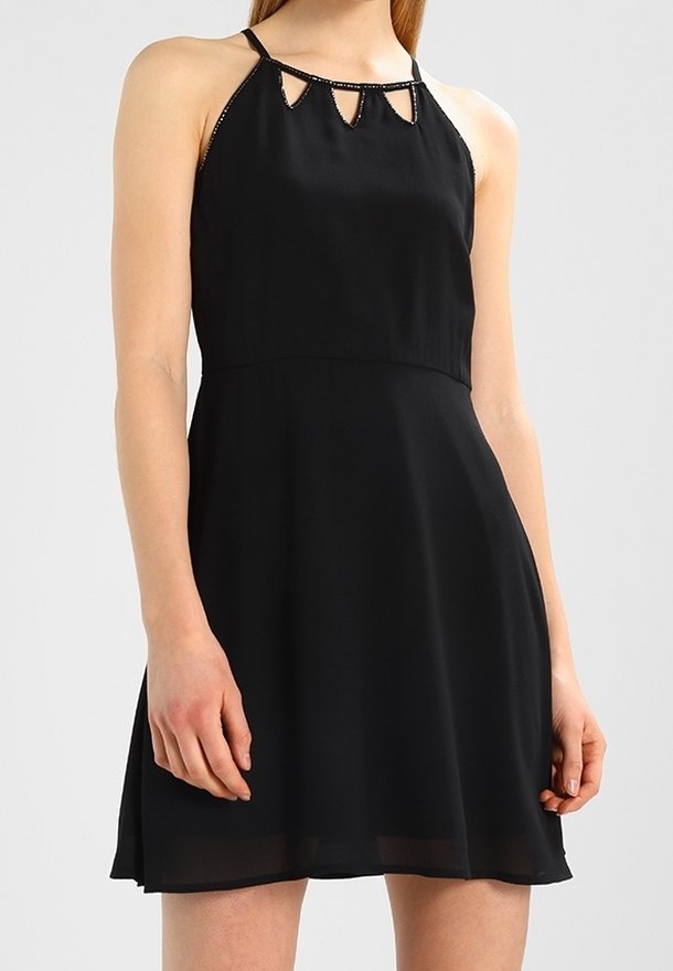 Sleeveless black dress with halter neckline and triangular cut-out accents along collar and flowing A-line skirt.