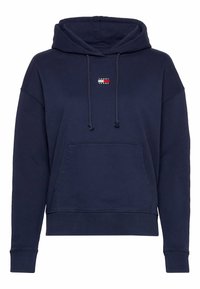 Felpa con cappuccio di colore blu navy, dotata di tasca frontale, dalla vestibilità morbida, e un piccolo logo applicato sul petto con dettagli in rosso, bianco e blu.
