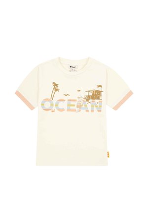 White short-sleeve toddler shirt with "OCEAN" in pastel stripes, featuring palm trees, birds, a lifeguard tower, and a child playing.