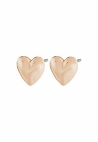 Hjerteformede øreringe i poleret rosaguld metal med en glat overflade og sølvstifter. Enkel design for en minimalistisk æstetik.