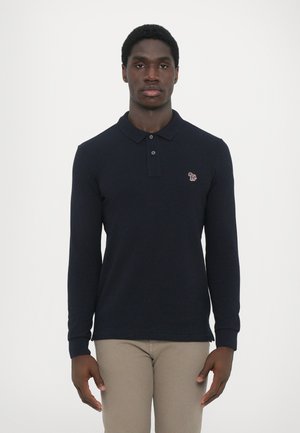 Navy long-sleeve polo shirt with a collar and two buttons, featuring a small embroidered logo on the left chest and ribbed cuffs.