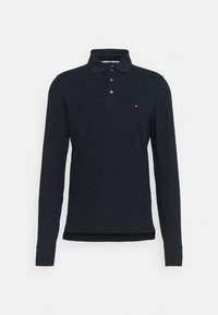 Polo-shirt à manches longues bleu marine en coton, doté d'un col, d'une patte de boutonnage à trois boutons et d'un petit logo sur la poitrine gauche.