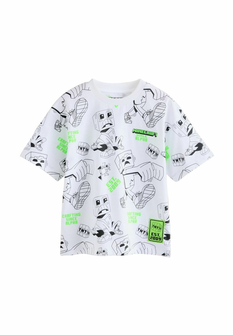 T-shirt blanc à manches courtes présentant divers designs de personnages Minecraft en noir et vert, avec du texte et une étiquette dans le coin inférieur.