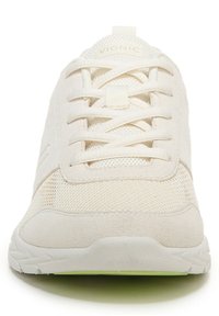 White athletic shoe with a combination of mesh and suede materials. Features rounded toe, flat laces, and a textured rubber sole.