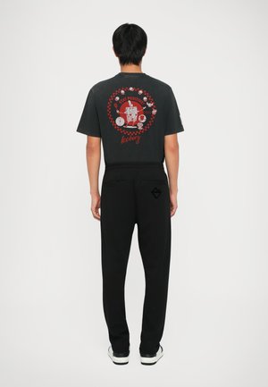 Tracksuit bottoms - nero