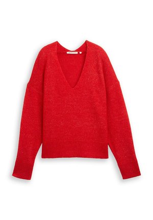 Red knitted sweater with a deep V-neck, relaxed fit, dropped shoulders, and ribbed hem. Soft texture with slight sheen and no visible patterns.