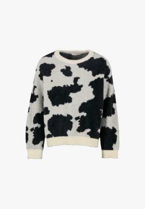 Knitted sweater with black and cream cow print, round neckline, ribbed hem, and soft texture. Long sleeves with a loose fit design.