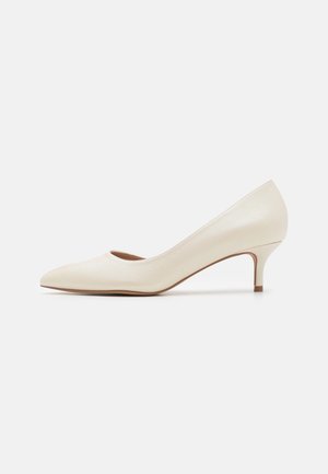 Klassiske pumps - white