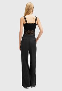AllSaints LACEY  - Stoffhose - black