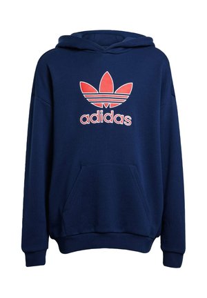 Navyblå huvtröja i bomullstyg. Har en stor röd Adidas Trefoil-logga och en framficka i känguru-stil.