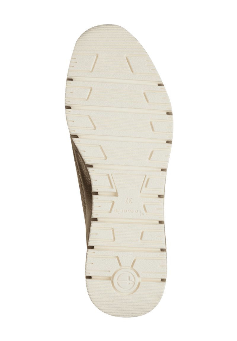 Sneakerzool met een dikke, gestructureerde witte rubberen onderkant met diepe groeven en een cirkelvormig logo. Het bovenste deel is van bruin suede, dat doorloopt naar de zool.