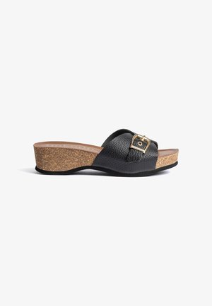 Black leather open-toe slide sandal with gold buckle, cork wedge heel, and rubber sole, shown from the side on a white background.
