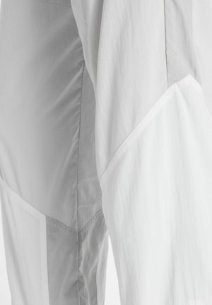 New Balance, ACHIEVE PANT - Pantalon classique - grey matter