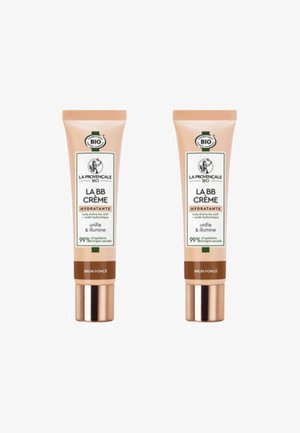 Deux tubes de crème BB, beige avec des accents verts et un texte marron. Les étiquettes indiquent "LA PROVENÇALE BIO" et "BRUN FONCÉ." Formule hydratante, 99 % d'ingrédients naturels.