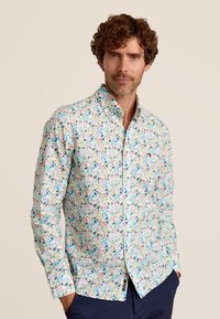 Langarmshirt van katoen met een kleurrijk bladenpatroon, voorzien van een button-down kraag en een slim fit ontwerp in lichte tinten.