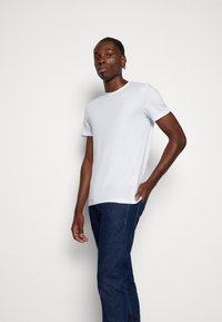 Tommy Jeans SCANTON SLIM - Vaqueros slim fit - denim dark
