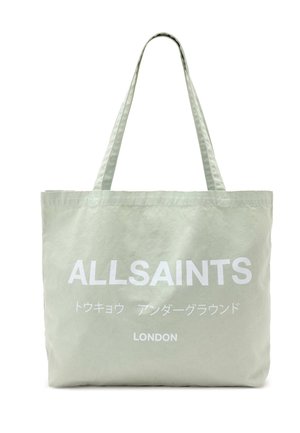 Lys beige mulepose med "ALLSAINTS," japanske tegn og "LONDON" trykt i hvidt på fronten, med to skulderstropper.